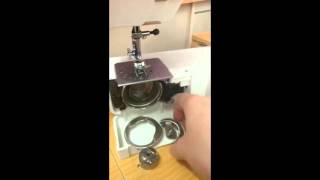 How to pull apart and reassemble the bobbin case area on a front loading sewing machine [upl. by Ettenhoj]