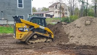 How To Spreading Top Soil With A Skidsteer [upl. by Aicelav]