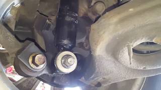 Hyundai rear shock removal  seized bushing [upl. by Earesed745]